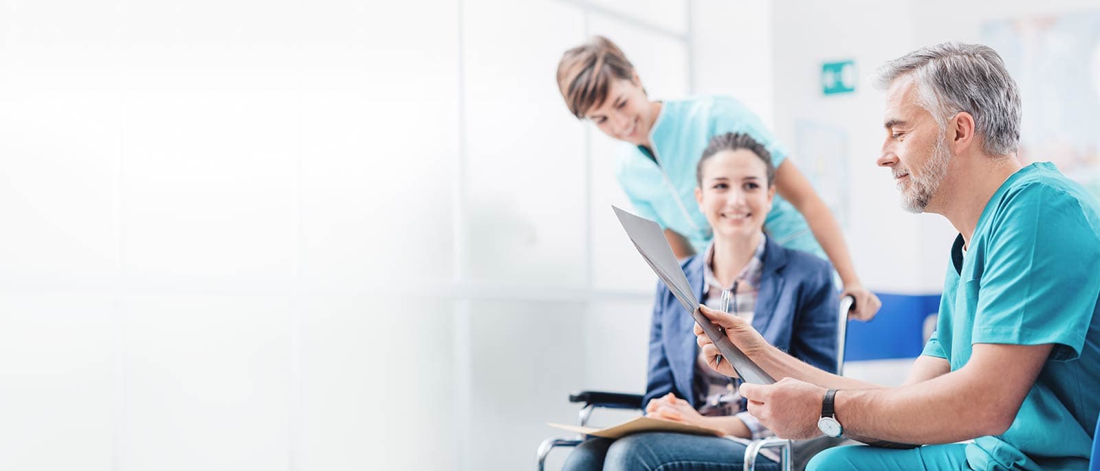 Healthcare professionals working with a patient